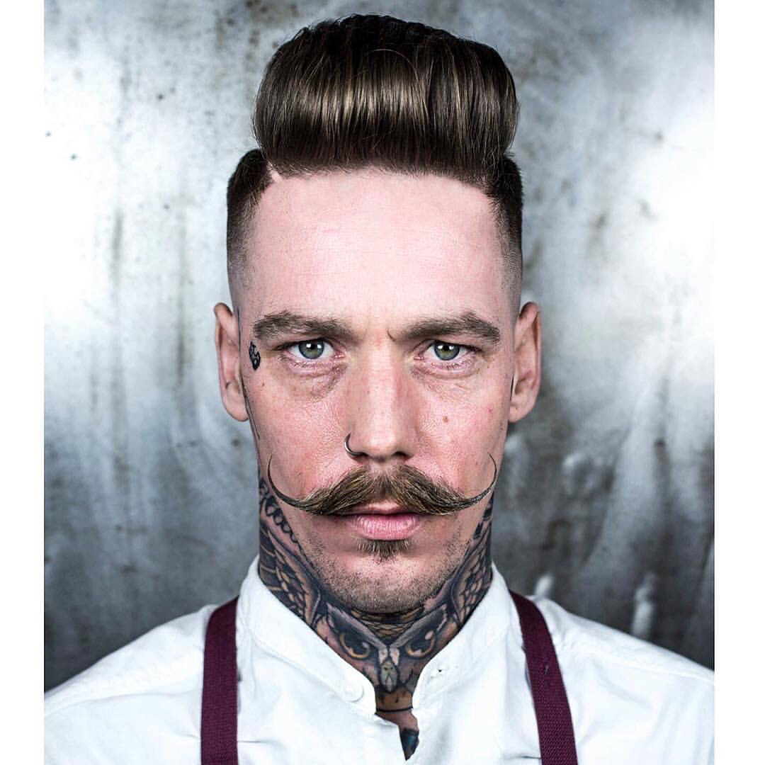 r.braid high puff pompadur with mustache mens haircuts