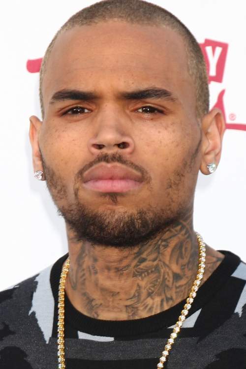 chris brown bald new haircut