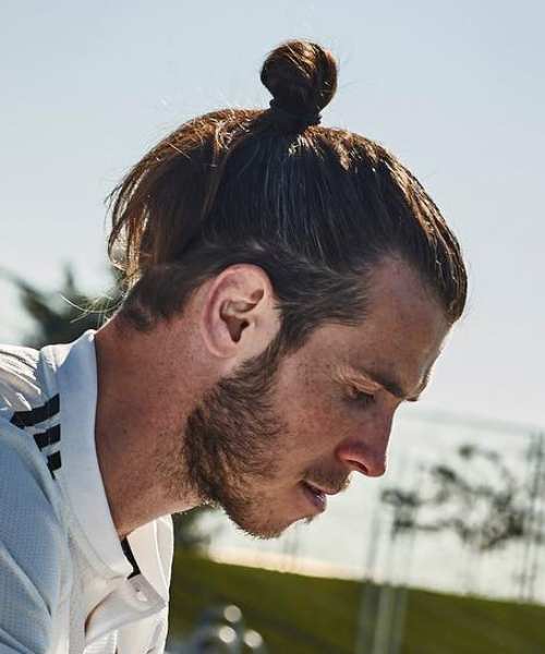 Gareth Bale shows off incredible long hair as Real Madrid outcast undoes  his man bun in Wales training  The Sun