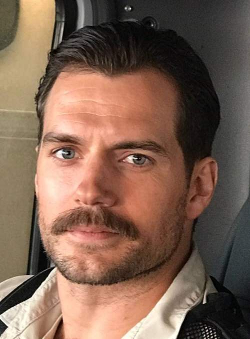 henry cavill mustache slicked back hairstyle