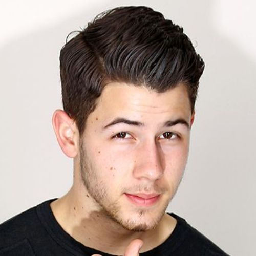 Nick Jonas Medium Curly Hairstyle