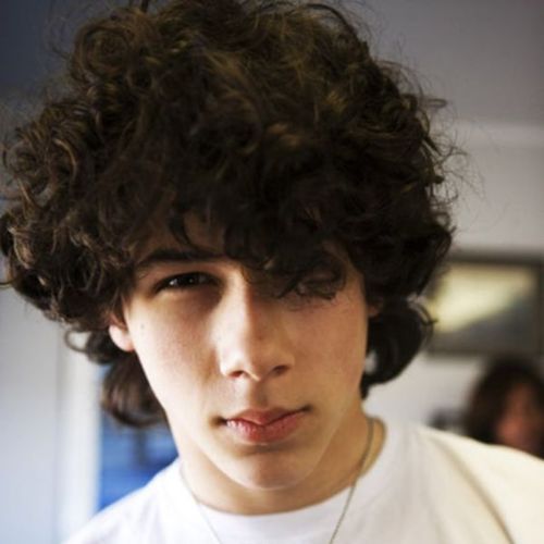 12 nick jonas hairstyle with curly puff hairstyle