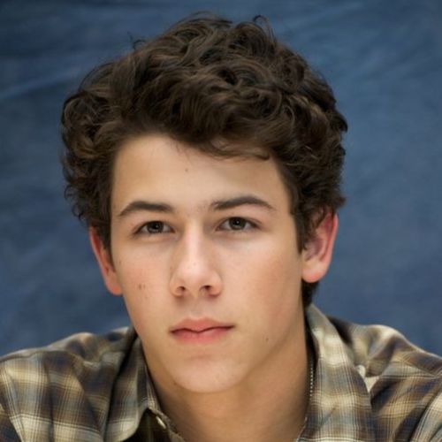 7 nick jonas young curly messy long hairstyle