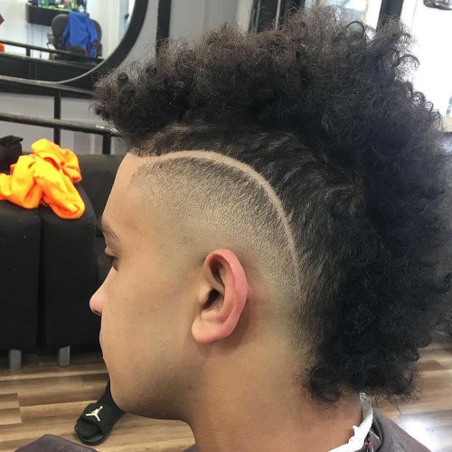 high curly mohawk fade haircut shaved line up