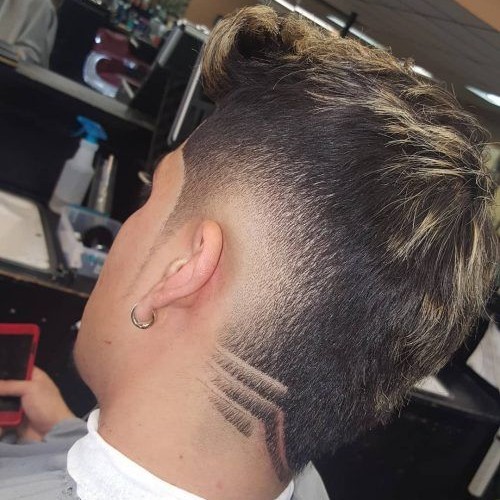 highlighted top hairstyle burst fade with design hairstyle