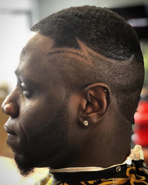 low fade haircut black man with hair design