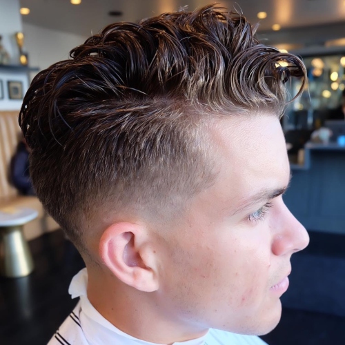 side part low fade haircut wavy hairstyle mens