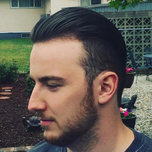 slicked back fade undercut haircut latest