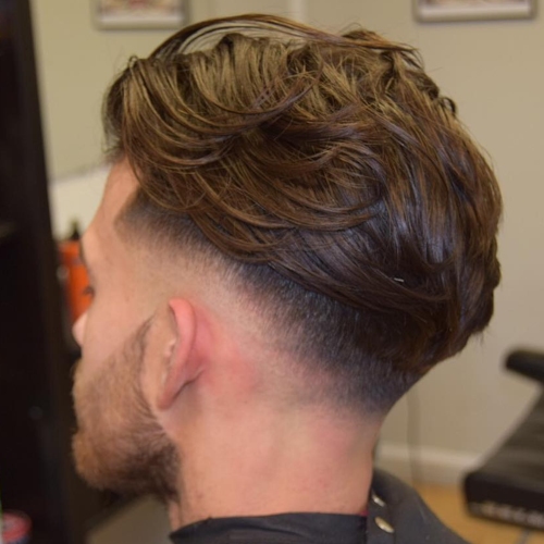 messy hairstyles for men undercut fade high textured layered